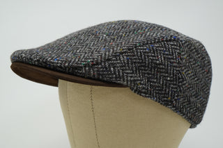 The Sloan - Irischer Tweed mit Lederschirmkappe